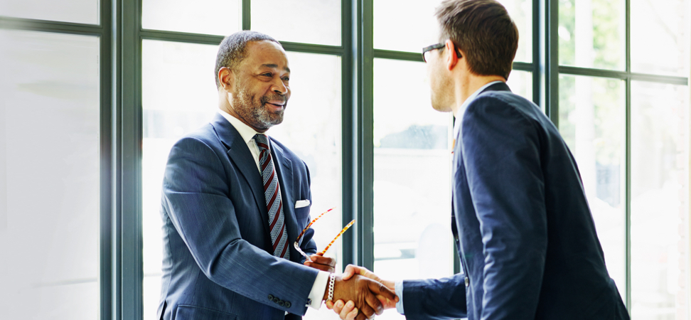 Two businessmen shaking hands